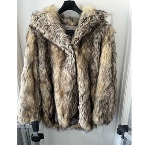 Brand new. With tags and plastic cover.